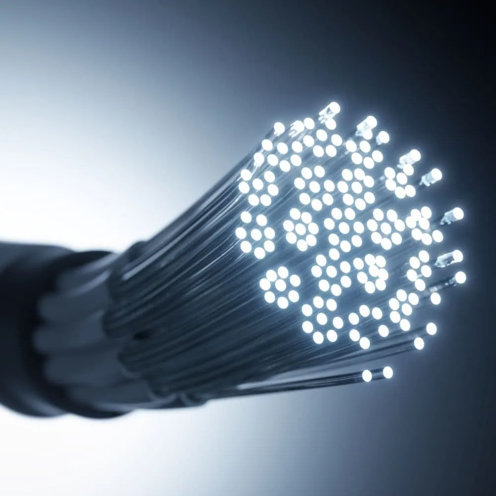 A close up of a wire with many lights, featuring Data Field Technology Services and highlighting their expertise in innovative tech solutions.