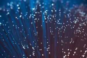 Image of a close-up view of a fiber optic cable, featuring DataField Technology Services and highlighting fiber optic termination methods.
