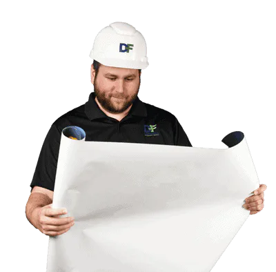 Portrait of a man with a confident expression, standing in front of the Datafield Technology Services logo. The man, identified as Datafield Engineer, appears to be a prominent figure associated with the company.