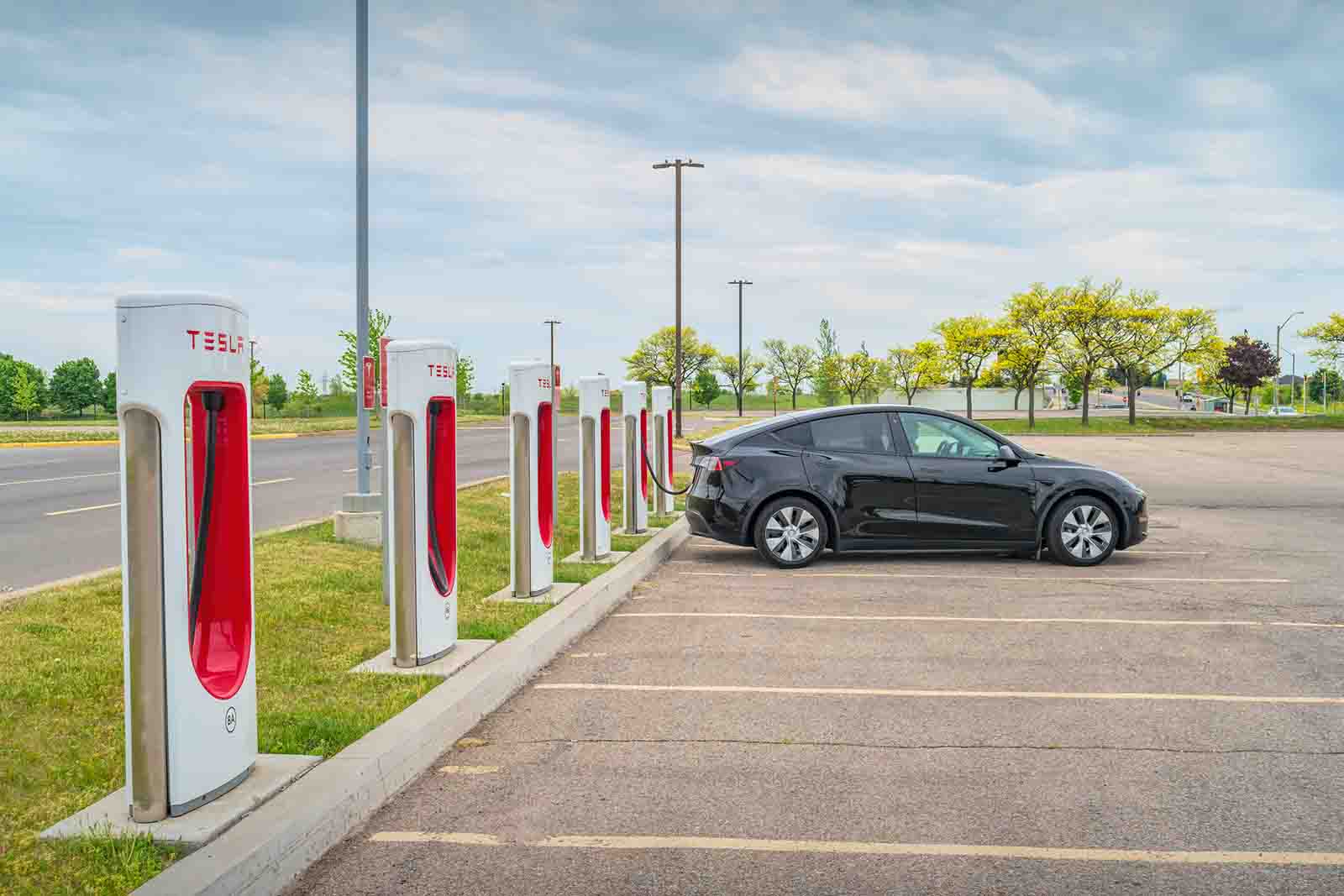 Image of a charging station car featuring Datafield Technology Services and highlighting Design Considerations for Electric Vehicle Charging Stations, ensuring alignment with the page's context.
