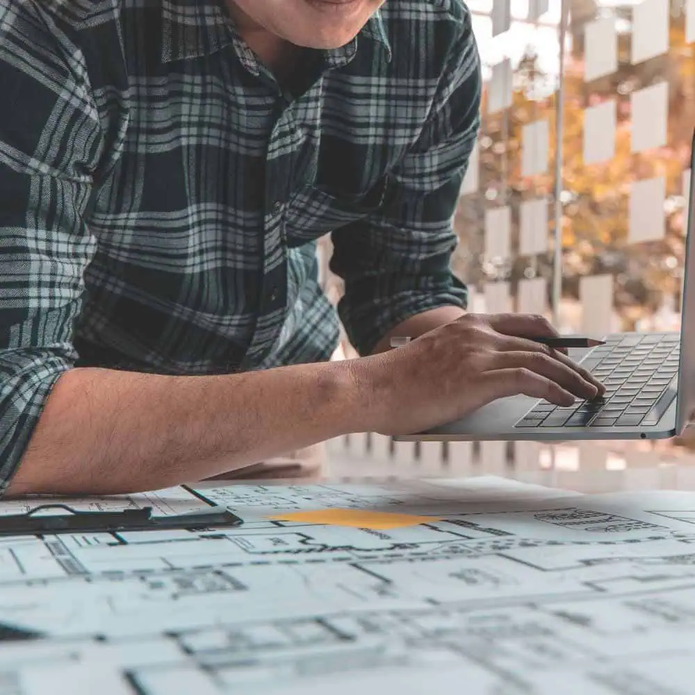 Man in front of a laptop, featuring Datafield Technology Services, and highlighting Experienced Technical Service Offerings, perfectly aligned with the page's context.